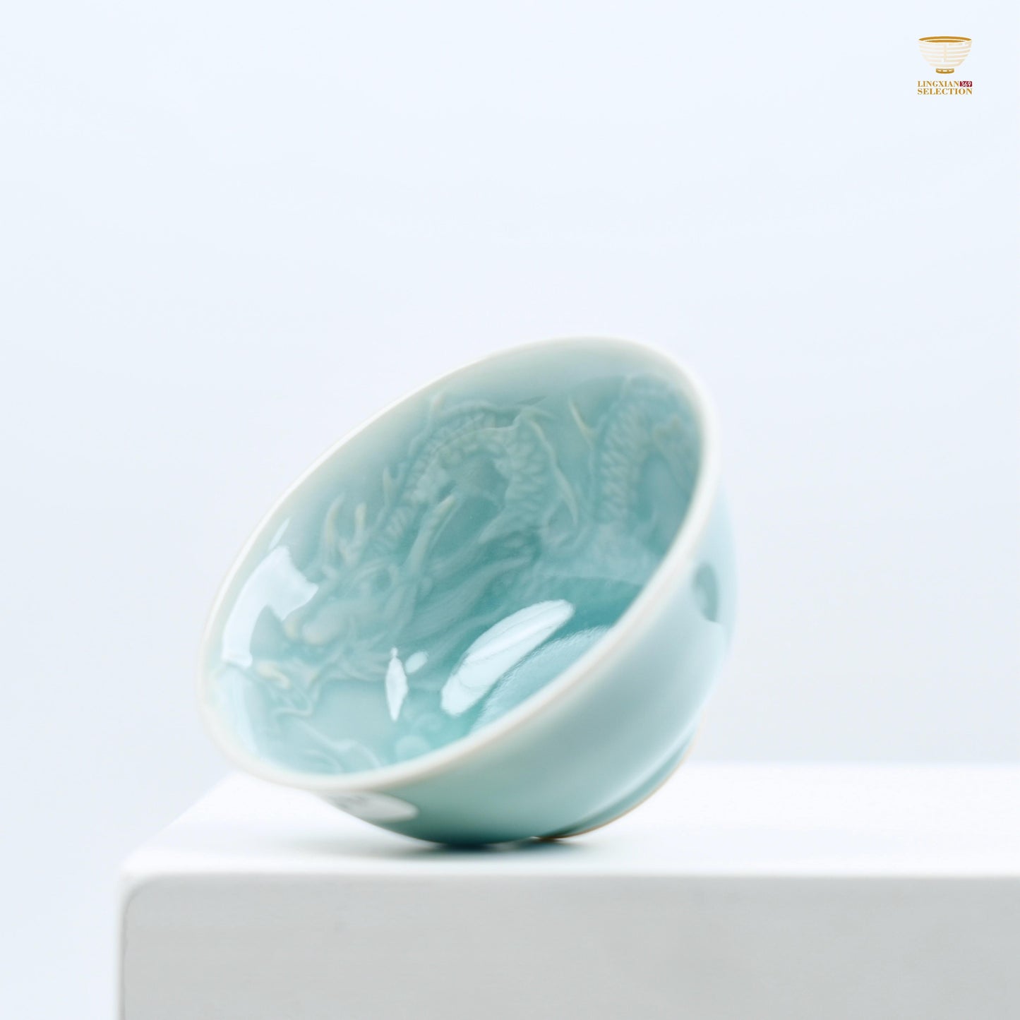 Celadon Relief Teacup by Lei Huixian | Glossy Jade-Like Glaze | Ideal for Daily Use or Gifting | Affordable Artisan Craft