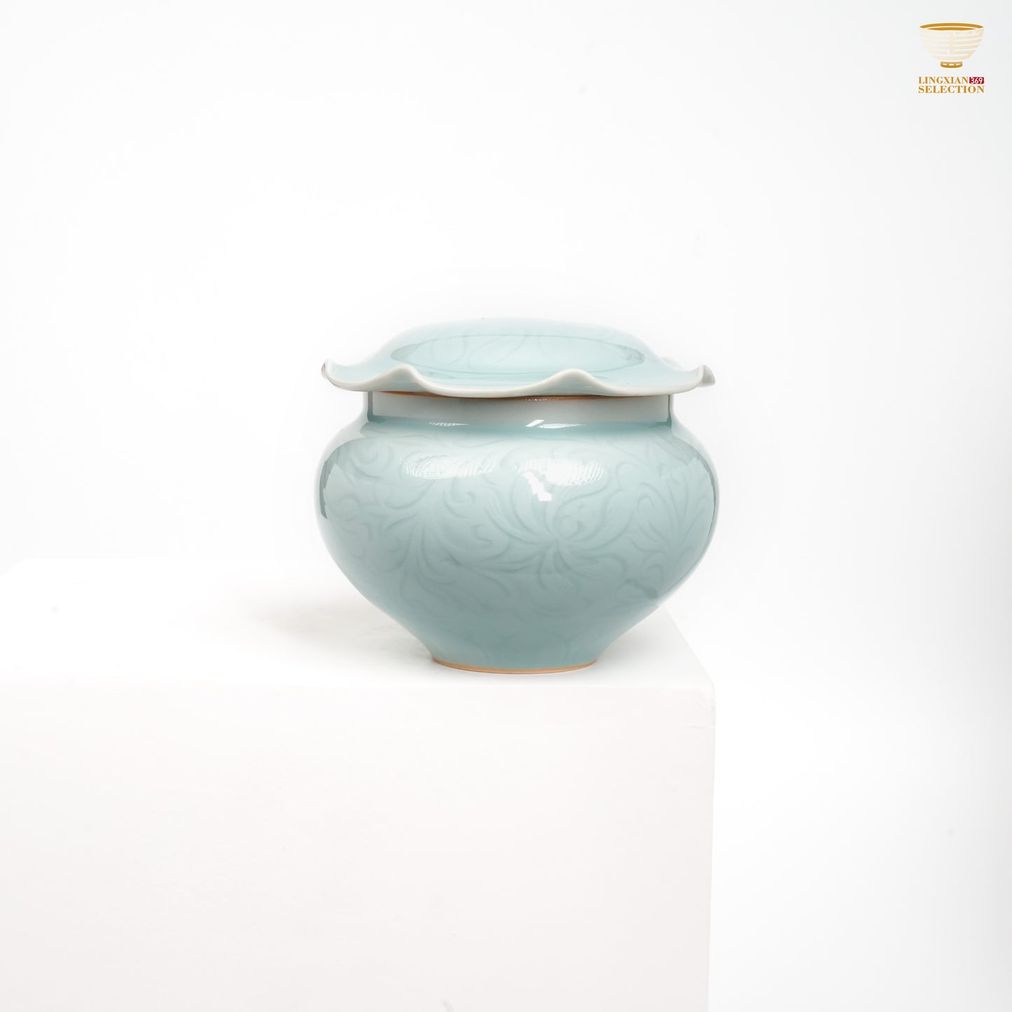 Jin Hongyang · Celadon Pink Blue Lotus Carved Tea Jar|Hand-Carved Elegance · High-Fire Porcelain · Refined Lotus Motif · Ideal for Sealed Tea Storage