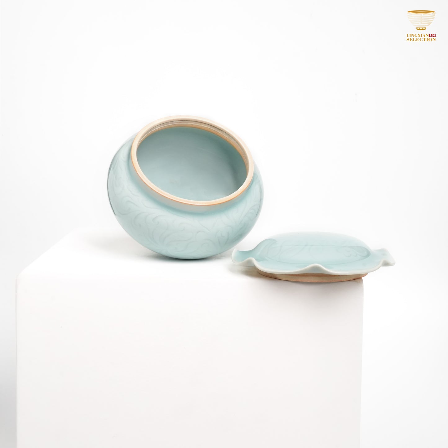 Jin Hongyang · Celadon Pink Blue Lotus Carved Tea Jar|Hand-Carved Elegance · High-Fire Porcelain · Refined Lotus Motif · Ideal for Sealed Tea Storage