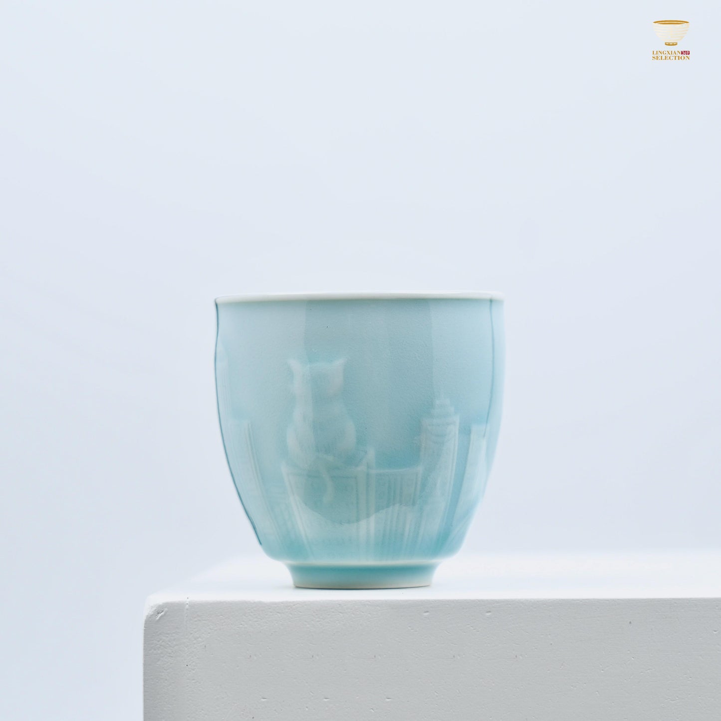Celadon Relief Teacup by Lei Huixian | Glossy Jade-Like Glaze | Ideal for Daily Use or Gifting | Affordable Artisan Craft