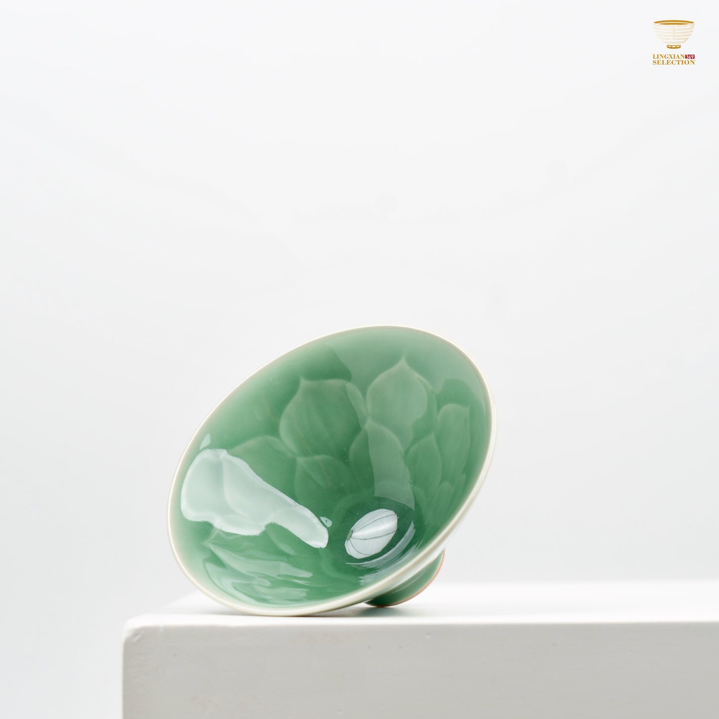 Celadon Relief Teacup by Lei Huixian | Glossy Jade-Like Glaze | Ideal for Daily Use or Gifting | Affordable Artisan Craft