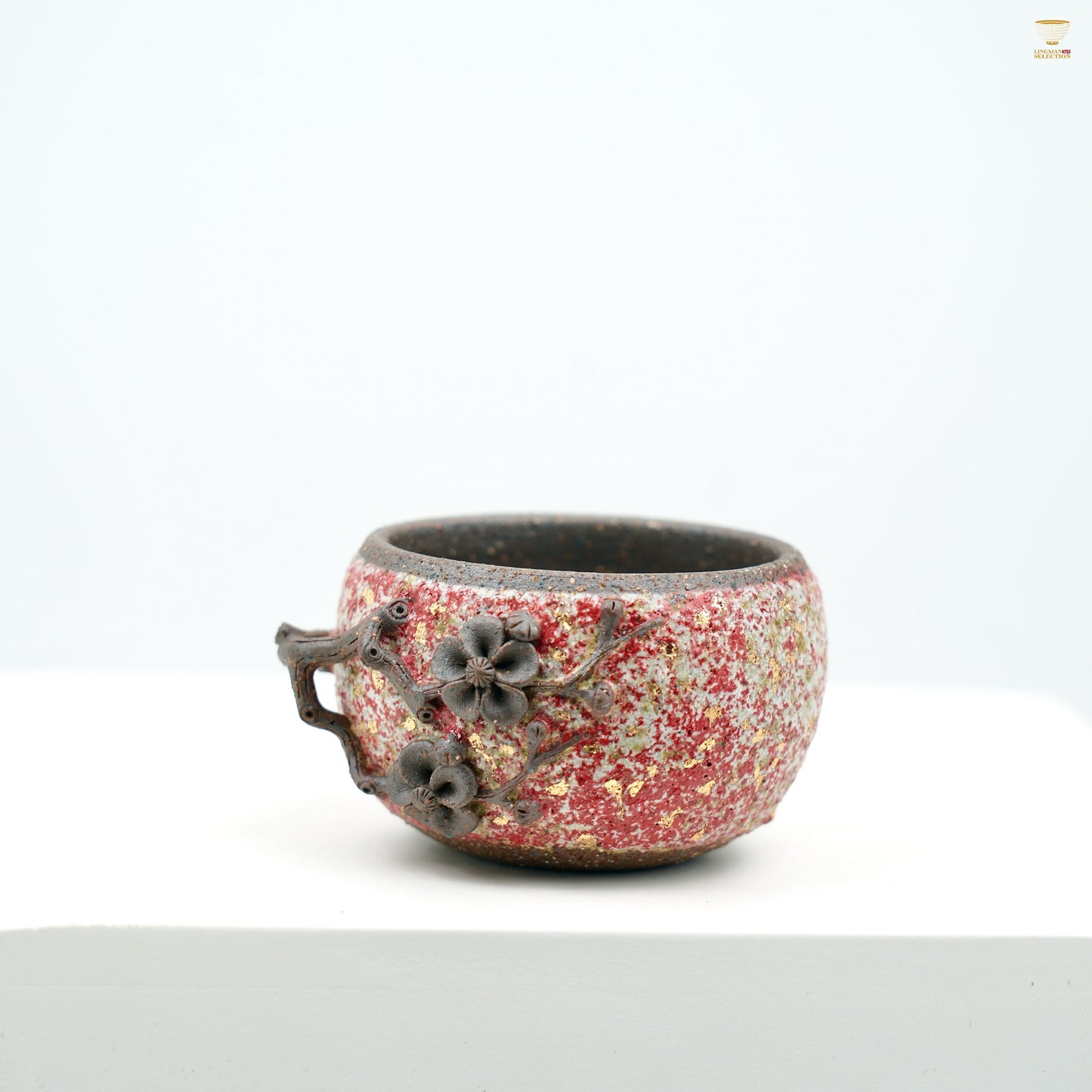 “Winter Plum” Volcanic Ore Teacup | Handmade Ceramic Cup with Red Plum Blossom Relief | Oriental Elegance Tea Vessel