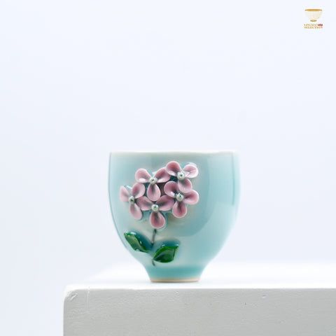 Celadon Relief Teacup by Lei Huixian | Glossy Jade-Like Glaze | Ideal for Daily Use or Gifting | Affordable Artisan Craft
