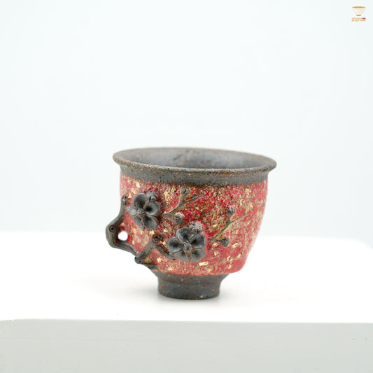 “Winter Plum” Volcanic Ore Teacup | Handmade Ceramic Cup with Red Plum Blossom Relief | Oriental Elegance Tea Vessel