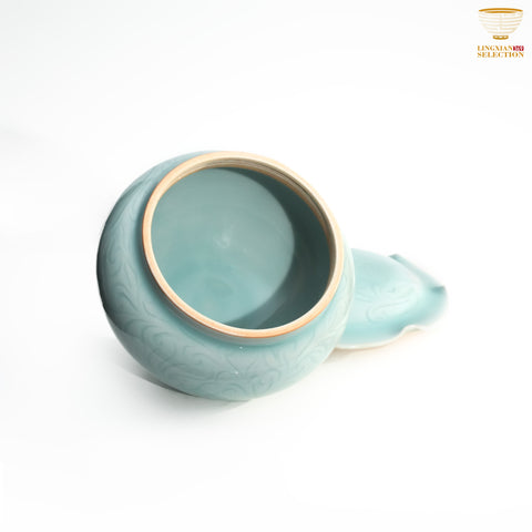 Jin Hongyang · Celadon Pink Blue Lotus Carved Tea Jar｜Hand-Carved Elegance · High-Fire Porcelain · Refined Lotus Motif · Ideal for Sealed Tea Storage