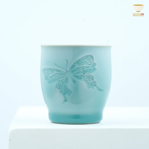 Light-Reactive Celadon Tea Cup with Carved Butterfly – Handmade Glowing Porcelain Art by Master LeiHuixian For Ceramic Art Collectors